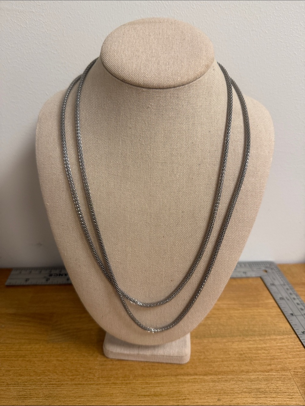 Long silver tone open tube metallic wrap necklace